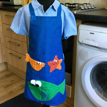 Load image into Gallery viewer, 3.Child’s blue apron with green fish pattern