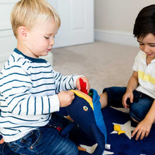 Load image into Gallery viewer, Children playing with eco friendly whale toy
