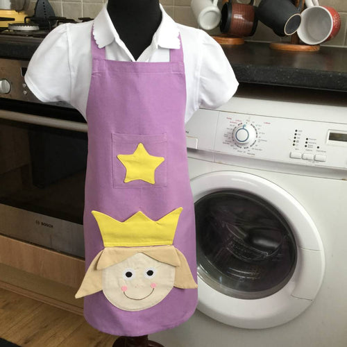 Child's princess pattern apron in kitchen