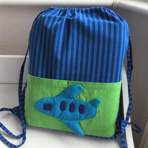 Blue & green striped fabric gym bag with plane on pocket